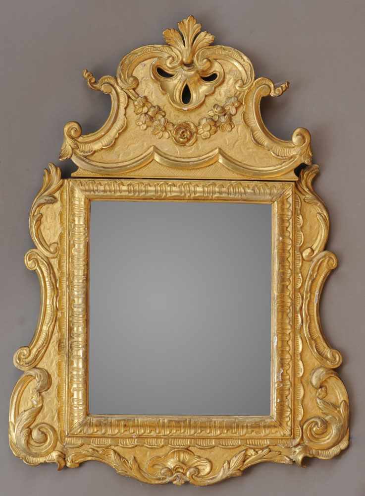 Appraisal: ITALIAN BAROQUE CARVED GILTWOOD MIRROR The rectangular plate within leaf