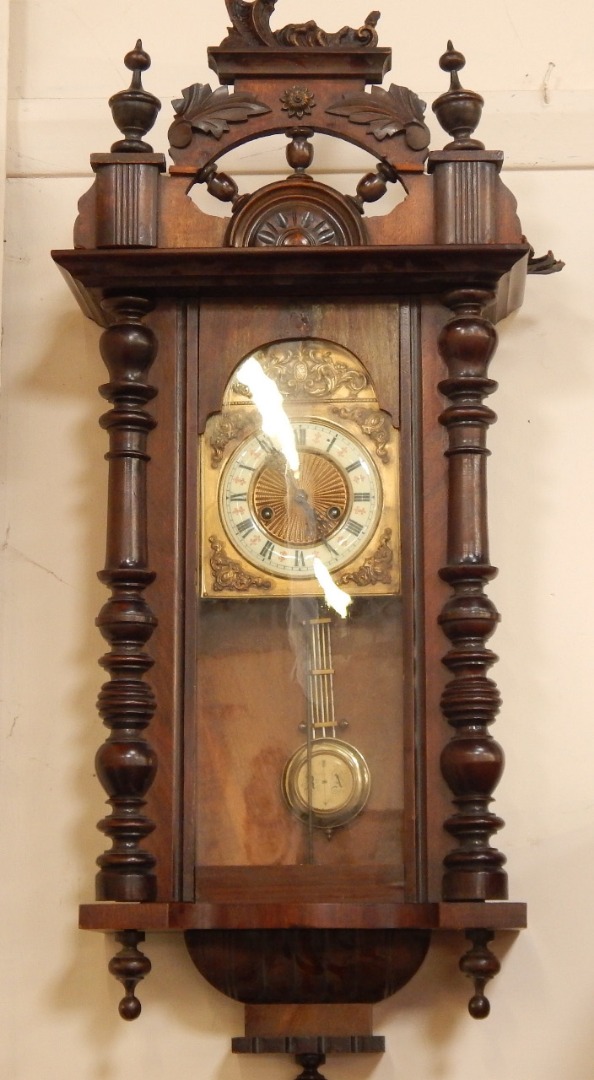 Appraisal: A thC walnut Vienna wall clock having separated chapter ring