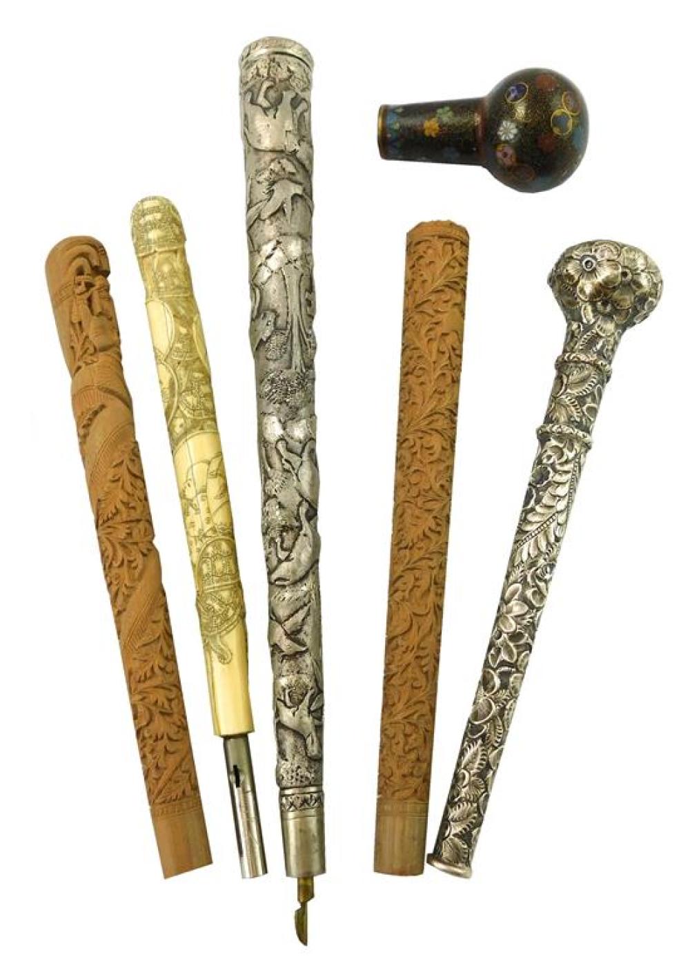 Appraisal: ASIAN Six assorted parasol cane handles including one floral repousse