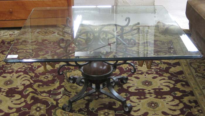 Appraisal: GLASS-TOP COMPASS POINT COFFEE TABLE having a clear square glass