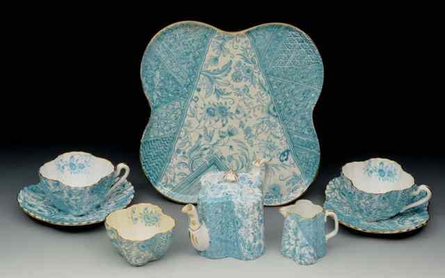 Appraisal: A VICTORIAN CERAMIC CABARET SET of stylised turquoise ground form