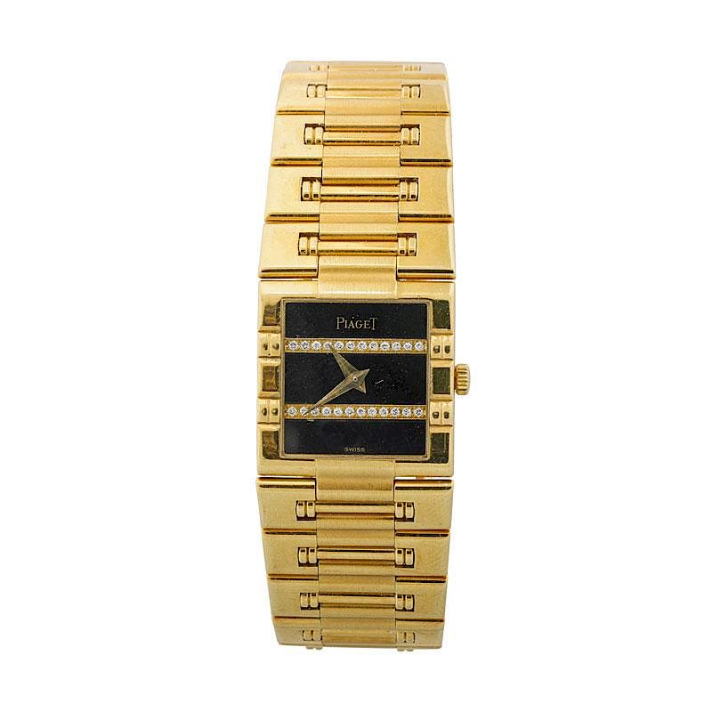 Appraisal: LADY'S PIAGET DANCER K GOLD DIAMOND ONYX WATCH An k