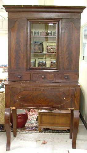 Appraisal: EMPIRE MAHOGANY SECRETARY BOOKCASE American c in two sections top