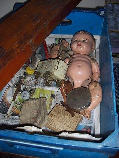 Appraisal: Sundry toys including a composition doll a doll's tinplate pram