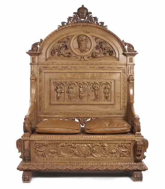 Appraisal: A Renaissance Revival Carved Oak Hall Bench having a carved