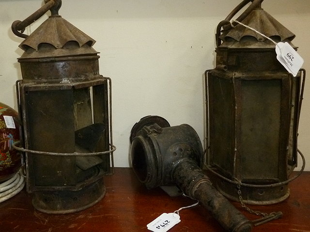 Appraisal: A BLACK PAINTED REAR CANDLE LANTERN high together with a