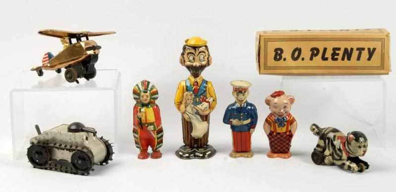 Appraisal: Lot of Tin Litho Character Wind-Up Toys Description American Working