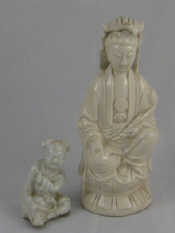 Appraisal: Two Chinese blanc de Chine figures a crying boy late