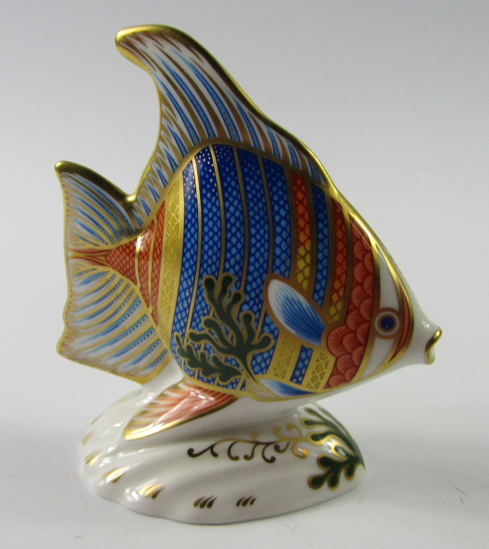 Appraisal: A Royal Crown Derby Imari paperweight modelled as the Pacific