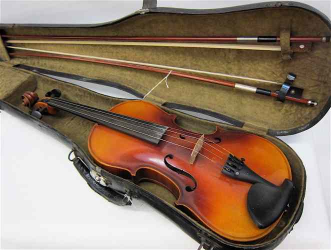 Appraisal: A CZECHOSLOVAKIA MADE VIOLIN with two bows in fitted and