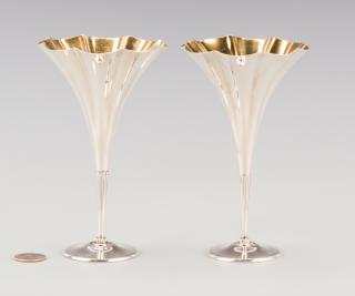 Appraisal: Pair Tiffany Sterling Trumpet Vases A pair of sterling silver