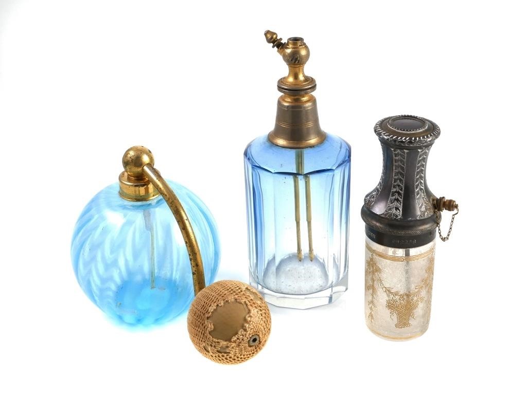 Appraisal: Three vintage perfume bottles including a French circa Le Parisien