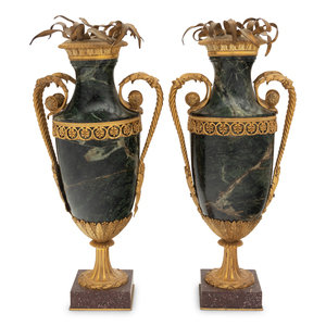 Appraisal: A Pair of Gilt Bronze Mounted Marble Urns on Porphyry