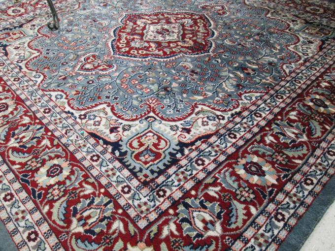 Appraisal: SQUARE HAND KNOTTED ORIENTAL CARPET Indo-Persian floral and central floral