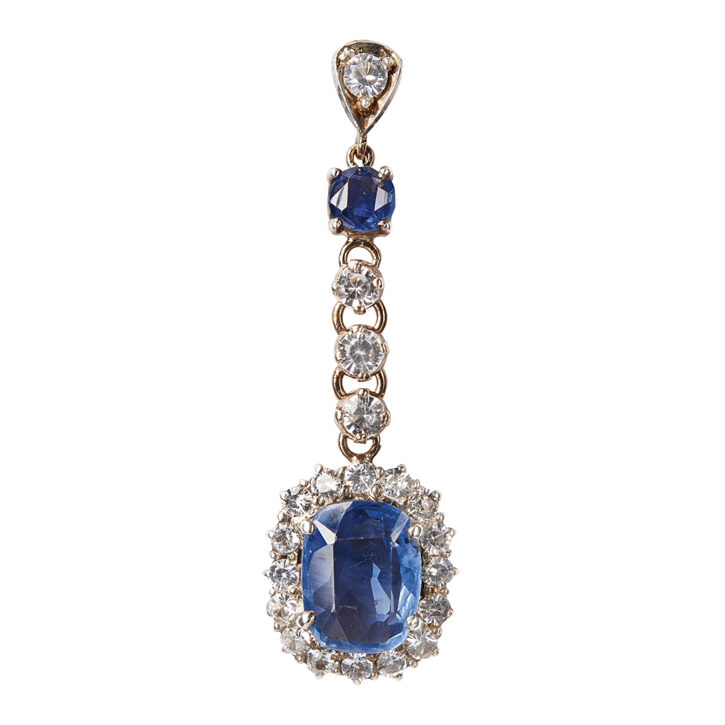 Appraisal: A sapphire and colourless zircon set pendant claw set with