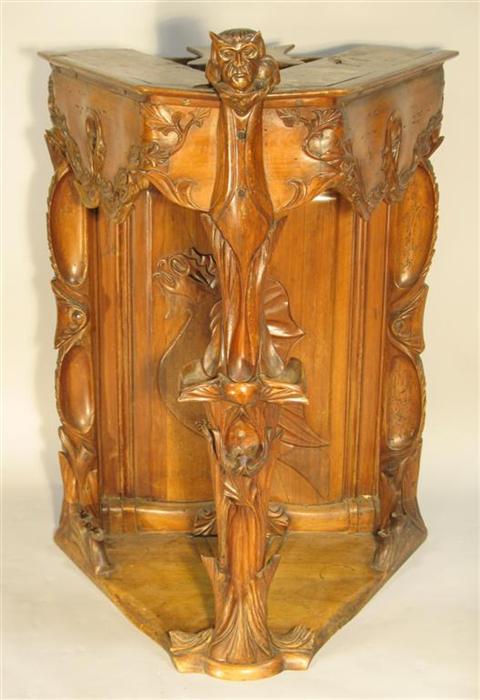 Appraisal: ART NOUVEAU STYLE HANGING SHELF th century the triangular shelf