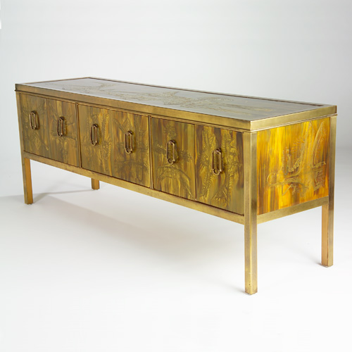 Appraisal: STYLE OF LAVERNE Brass sideboard its six doors with large