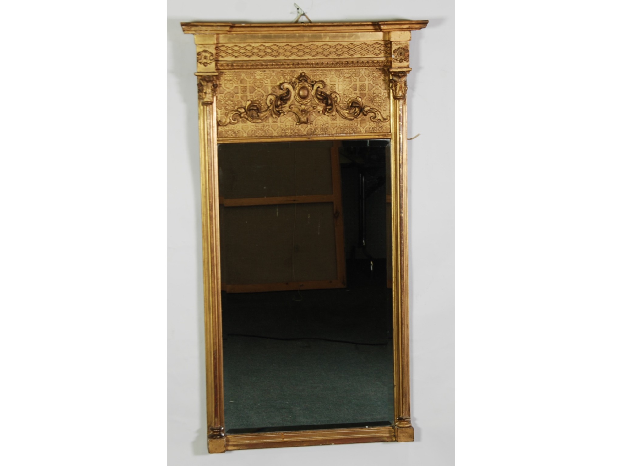 Appraisal: EARLY NINETEENTH CENTURY GILT GESSO PIER MIRROR the oblong bevel