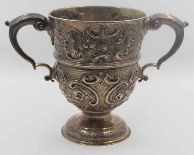 Appraisal: STERLING Antique Repousse Irish Silver LovingCup Repousse floral and scrolling