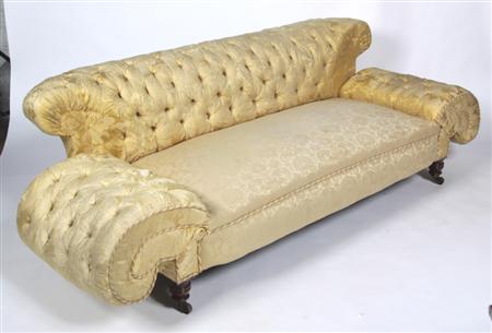 Appraisal: A late Victorian buttoned Chesterfield settee the arched back over