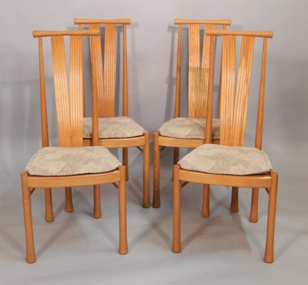 Appraisal: A set of four Ercol light elm reed back dining