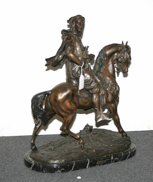 Appraisal: A French patinated bronze equestrian group of an Arab soldier