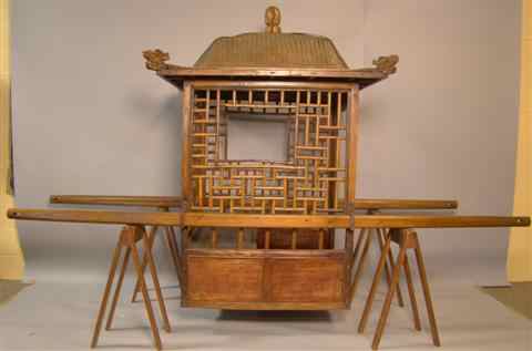 Appraisal: CHINESE CARVED ELMWOOD SEDAN CHAIR th century with serpentine domed