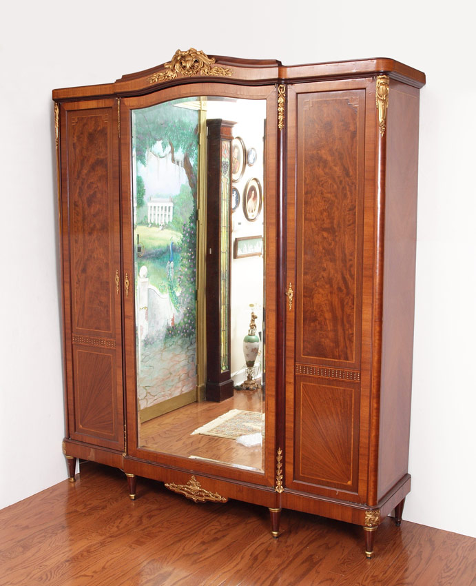 Appraisal: MONUMENTAL ' TALL FRENCH STYLE ARMOIRE Bronze foliate crest with