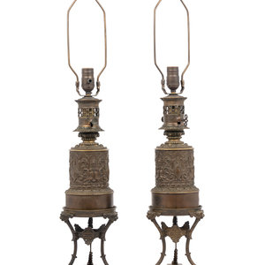 Appraisal: A Pair of French Bronze Fluid Lamps Converted to Electricity