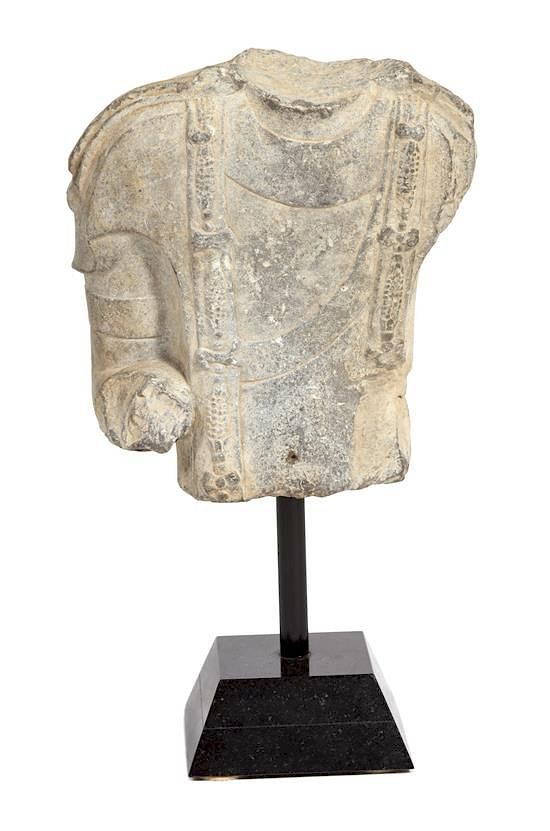 Appraisal: A Chinese Carved Stone Torso Fragment Height of fragment x