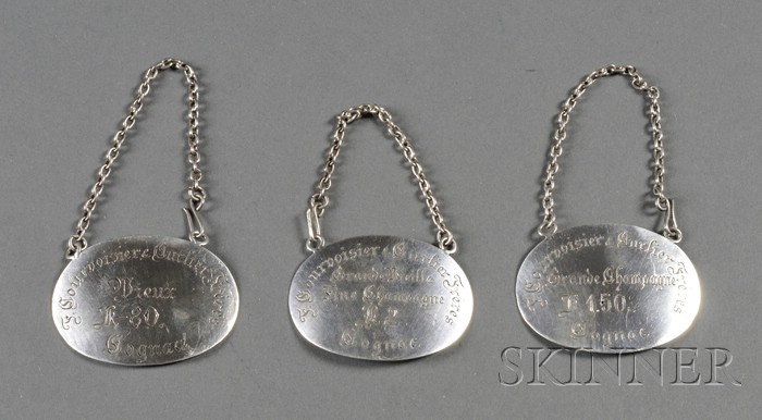 Appraisal: Set of Three Austro-Hungarian Silver Bottle Tickets - oval engraved