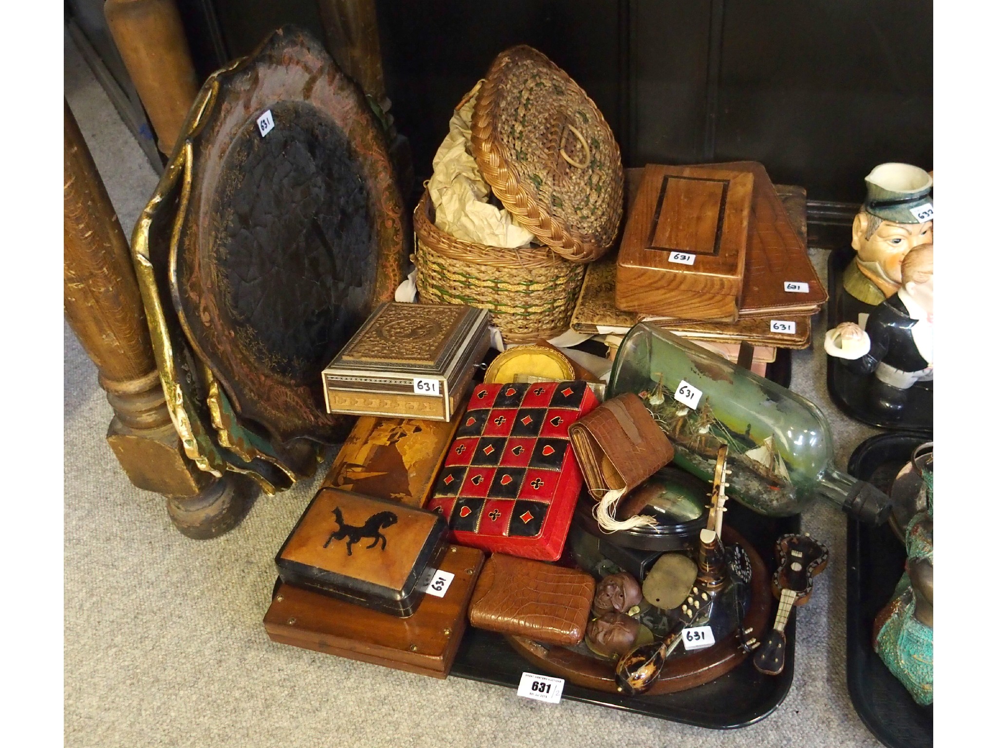 Appraisal: Assorted leather bound items ship in a bottle wooden trays