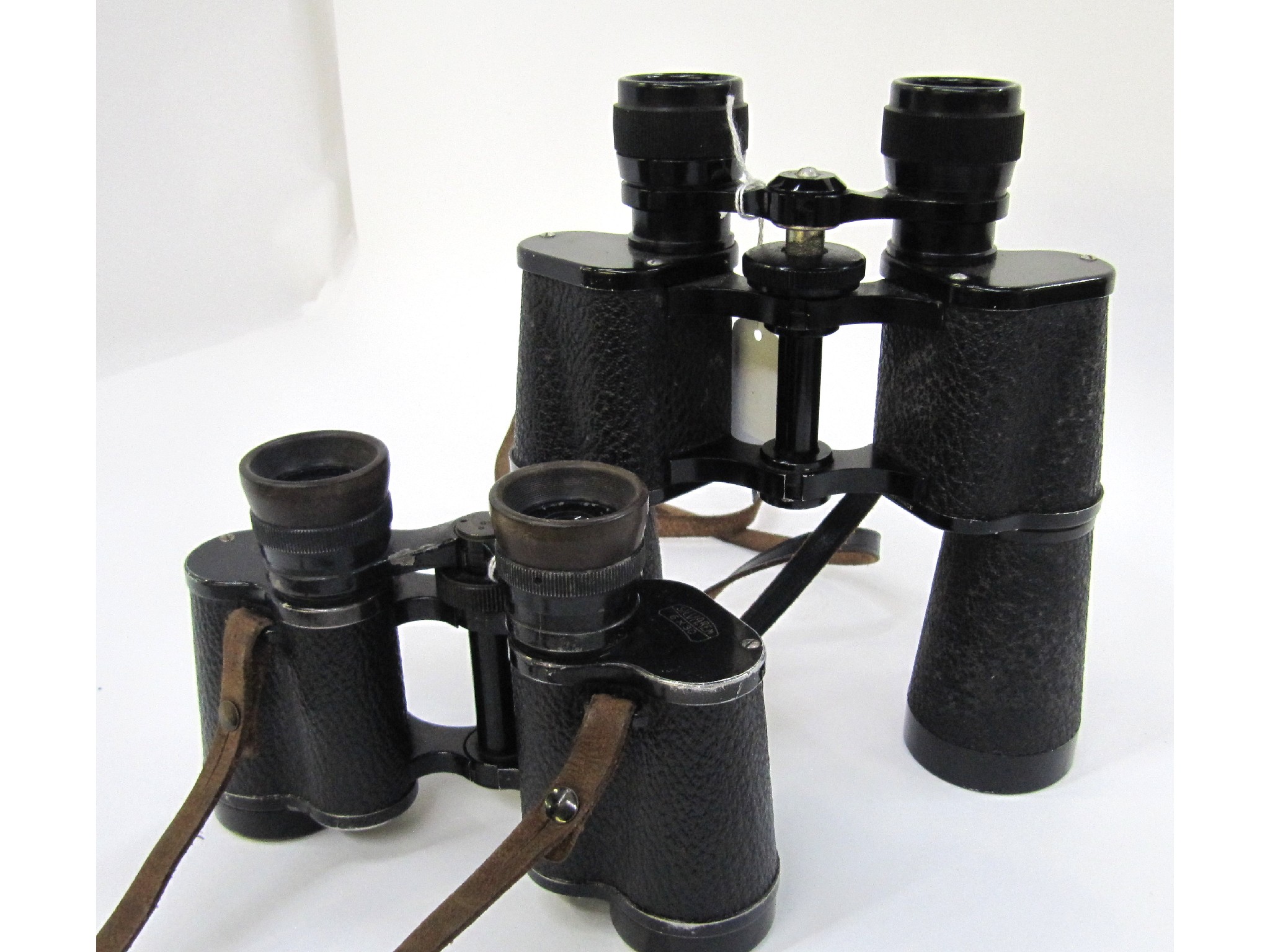 Appraisal: A lot comprising two pairs of binoculars