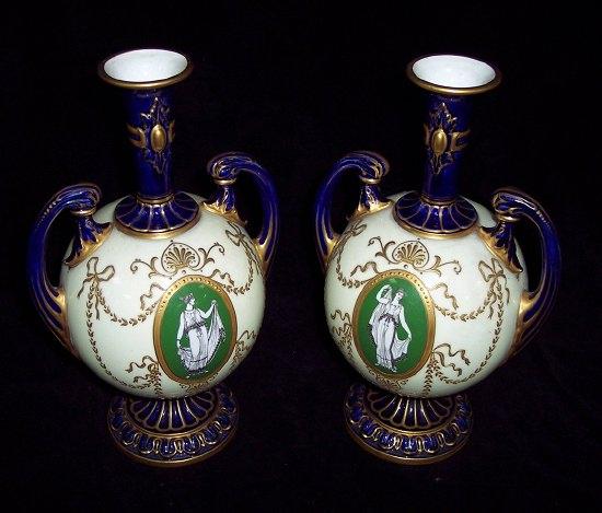 Appraisal: A pair of Royal Worcester vases of classical shape with