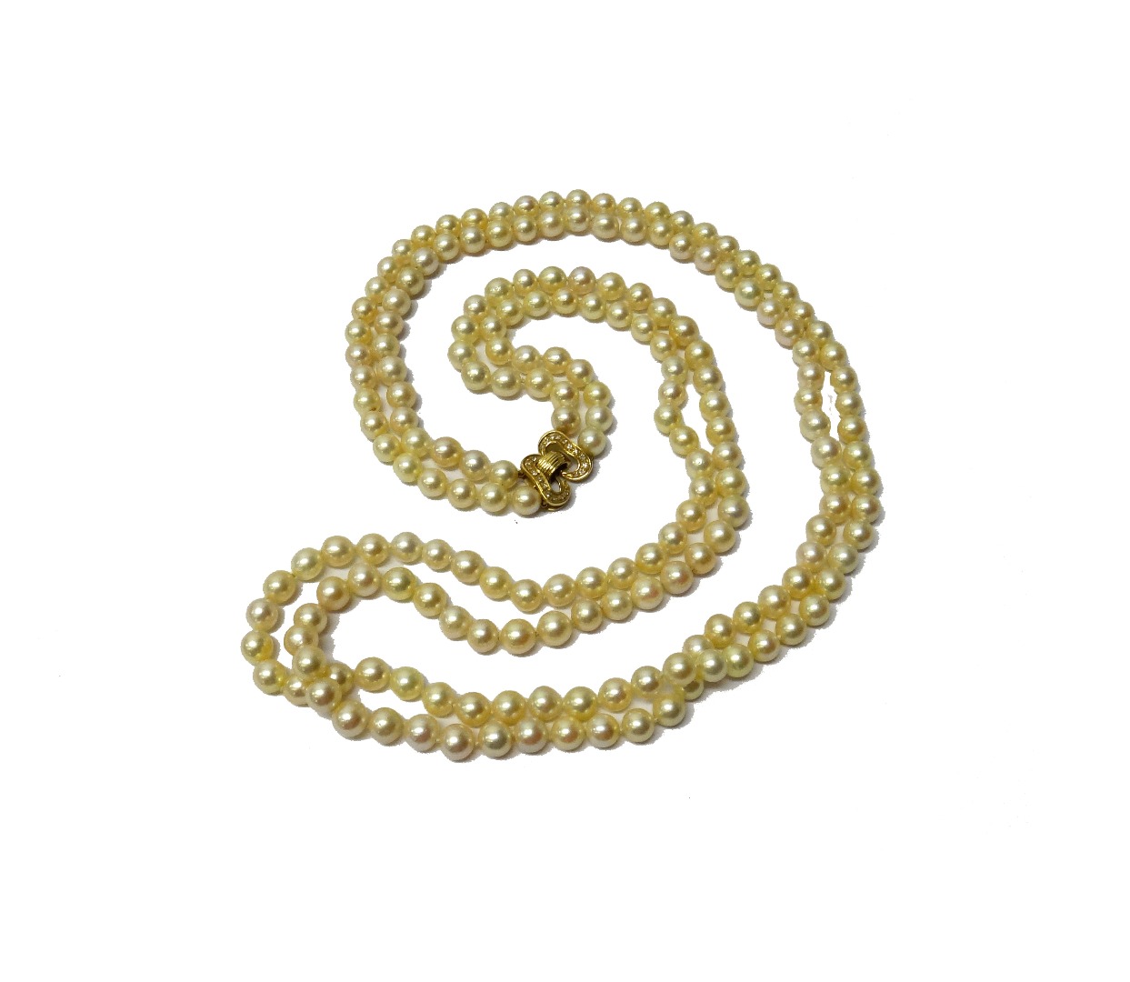 Appraisal: A two row necklace of slightly graduated cultured pearls on