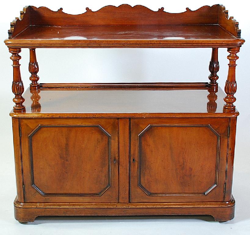 Appraisal: EARLY VICTORIAN CARVED MAHOGANY TWO TIER BUFFET the oblong top