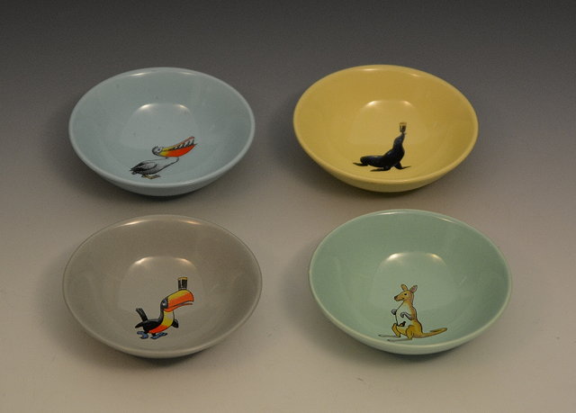 Appraisal: Four Wade Regicor Guinness advertising bowlsin four different colours showing