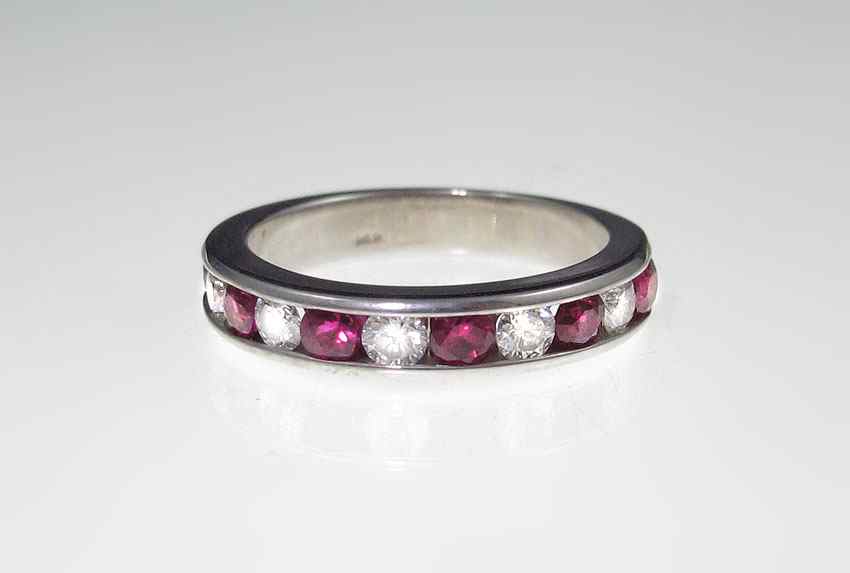 Appraisal: RUBY AND DIAMOND BAND K white gold contain six round