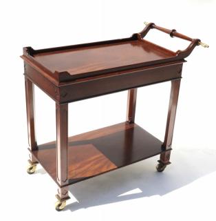 Appraisal: Regency Style Mahogany Tea Cart Two tiers on castors with