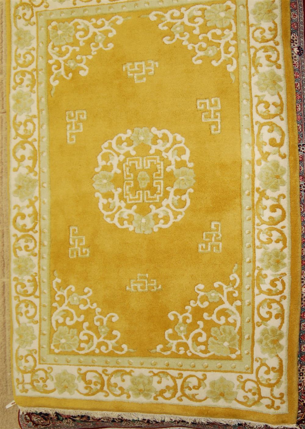 Appraisal: CHINESE MING HANDMADE ORIENTAL RUG having a gold field with