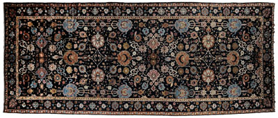 Appraisal: Agra rug elaborate intertwined flowers and vines with ribbon highlights