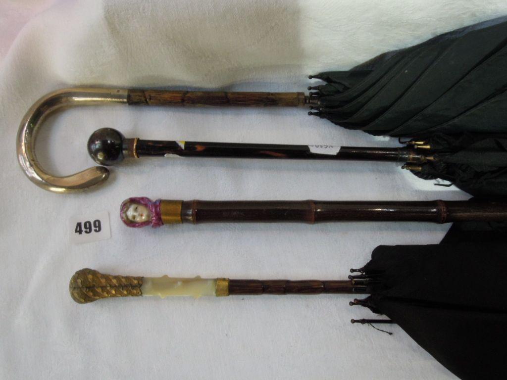 Appraisal: A late th century black silk umbrella with Fox Paragon