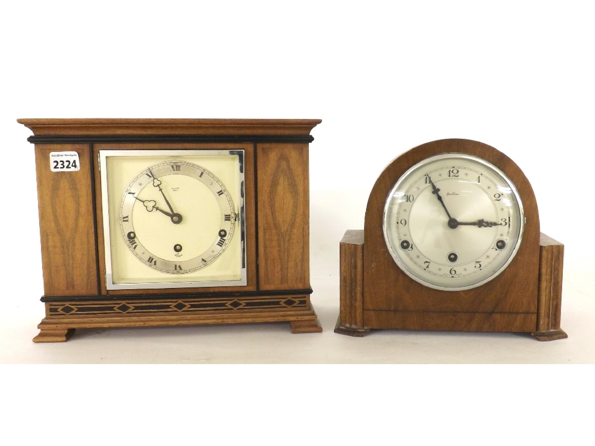 Appraisal: Elliott walnut three train mantel clock striking on four rods