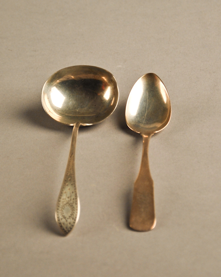 Appraisal: Two Pieces of Silver Flatware a coin silver spoon by