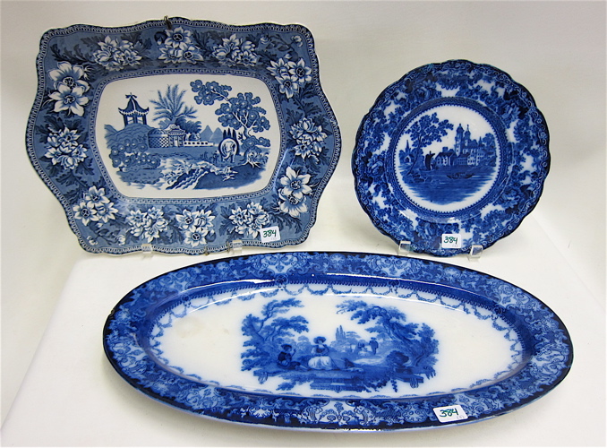 Appraisal: TWO ENGLISH BLUE AND WHITE PLATTERS AND ONE FLOW BLUE