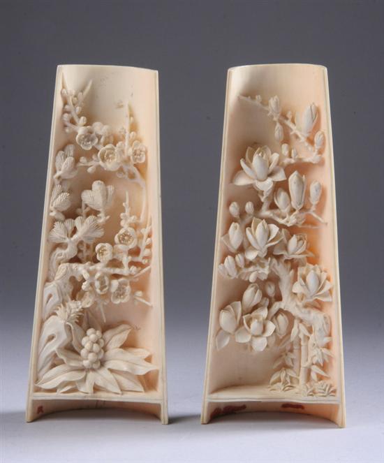 Appraisal: PAIR CHINESE CARVED IVORY WRIST RESTS - in long One