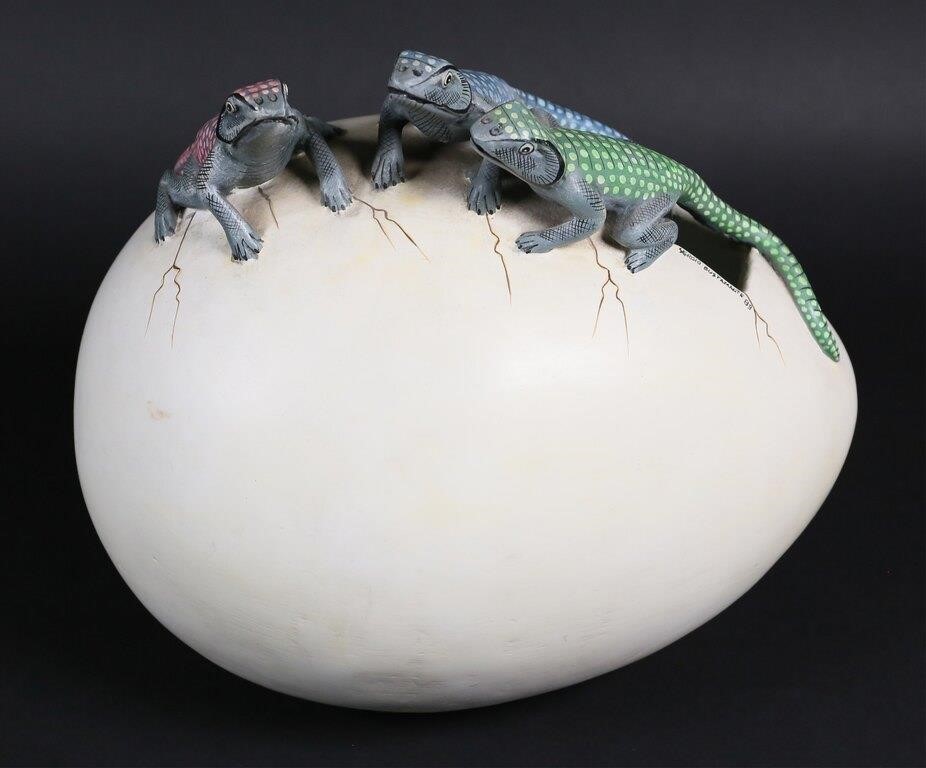 Appraisal: Sergio Bustamante Mexican born Lizards hatching from cracking egg sculpture