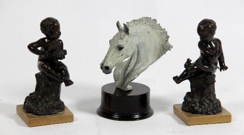 Appraisal: Two bronze figures of seated putti signed Kittler and a