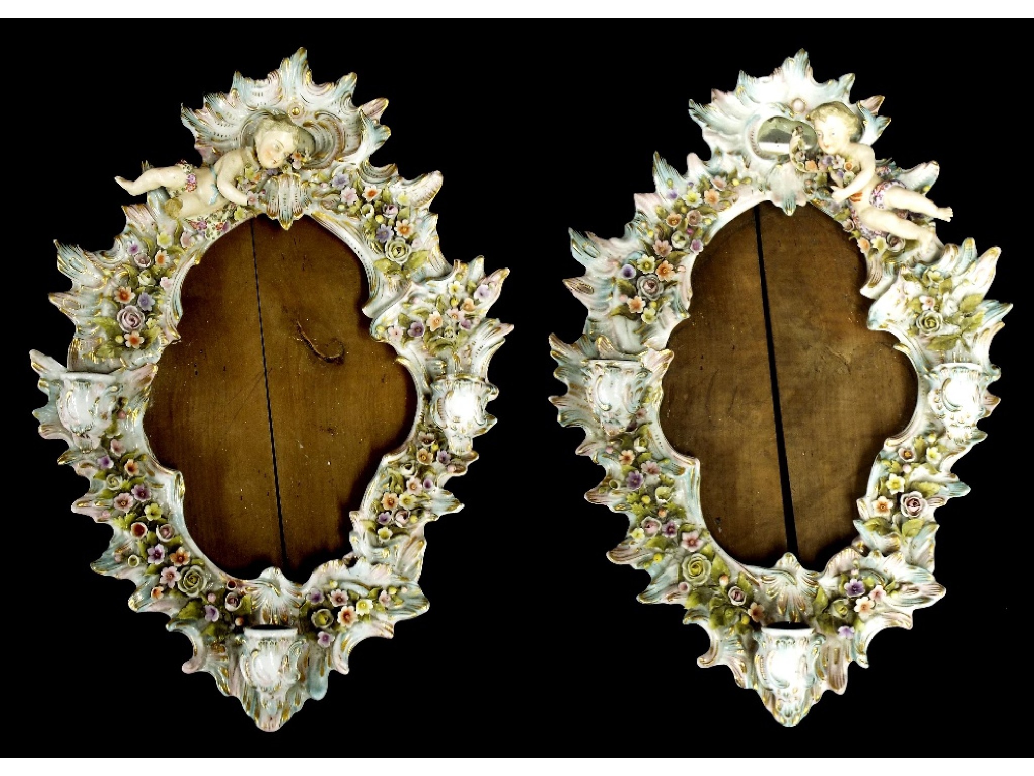 Appraisal: Pair of Dresden porcelain girandole wall frames mirrors mounted by