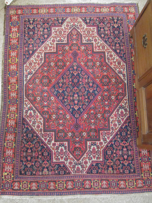 Appraisal: SEMI-ANTIQUE PERSIAN HAMADAN AREA RUG geometric and Herati floral hand